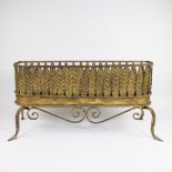 Mid-century jardiniere in gilt brass, decorated with leaves