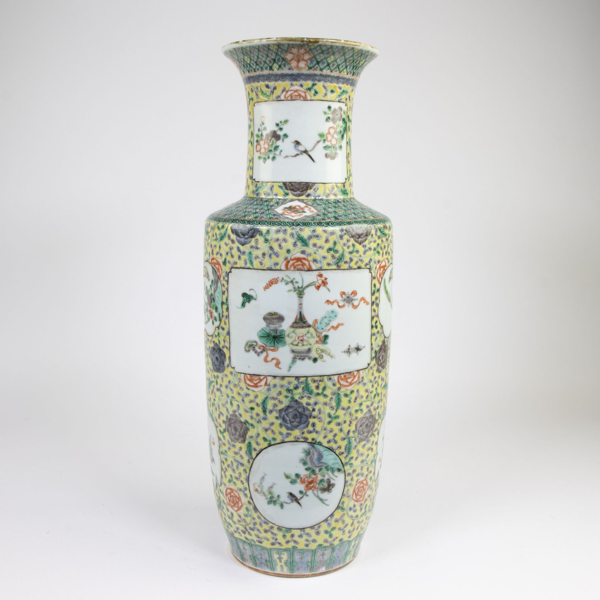 Famille verte rouleau vase with decor of valuables, birds and flowers