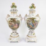 Pair of German porcelain show vases, hand-painted with romantic decor, ram's heads and with raised f