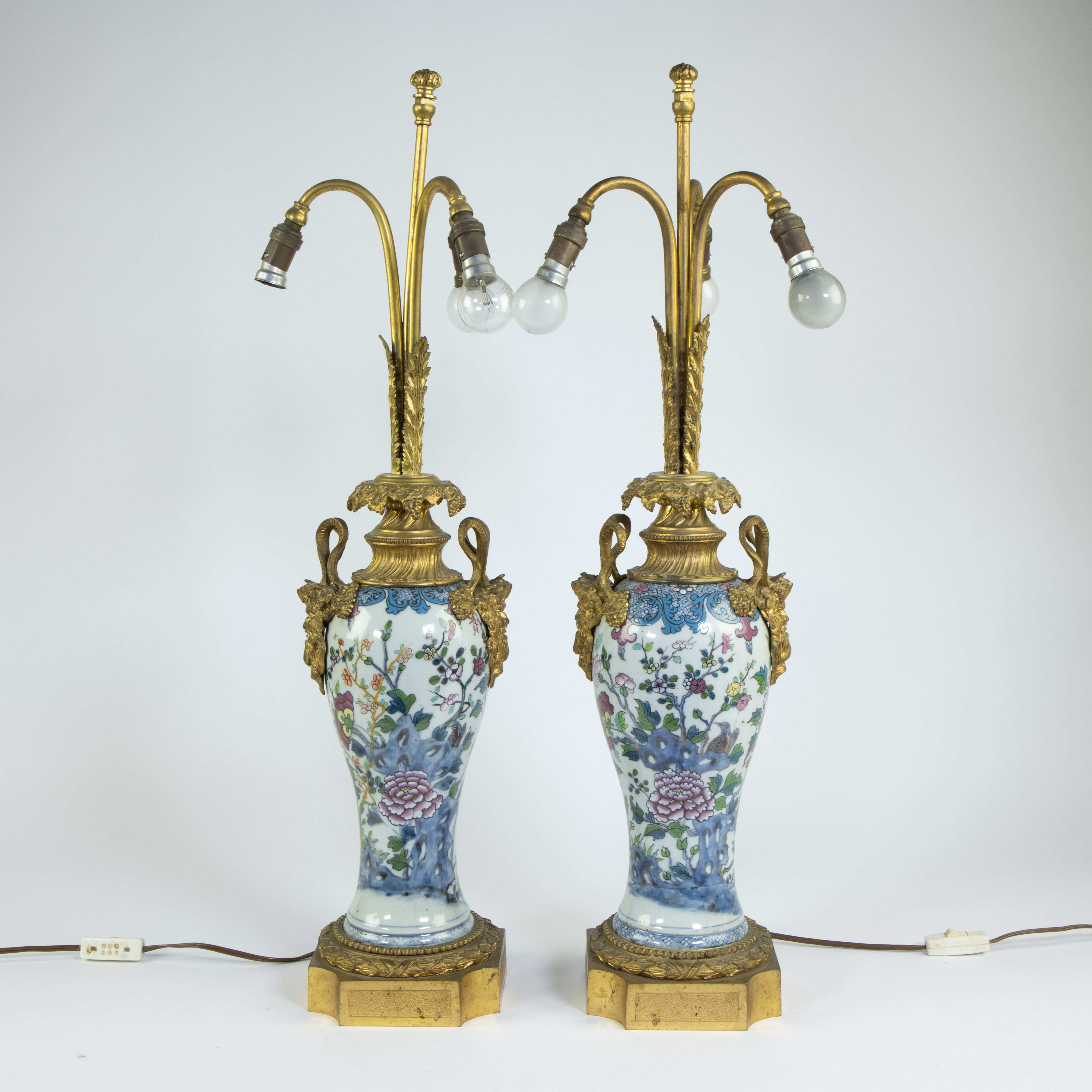 Pair of Chinese famille rose vases transformed into lampadaires with gilt bronze mounts, 19th centur