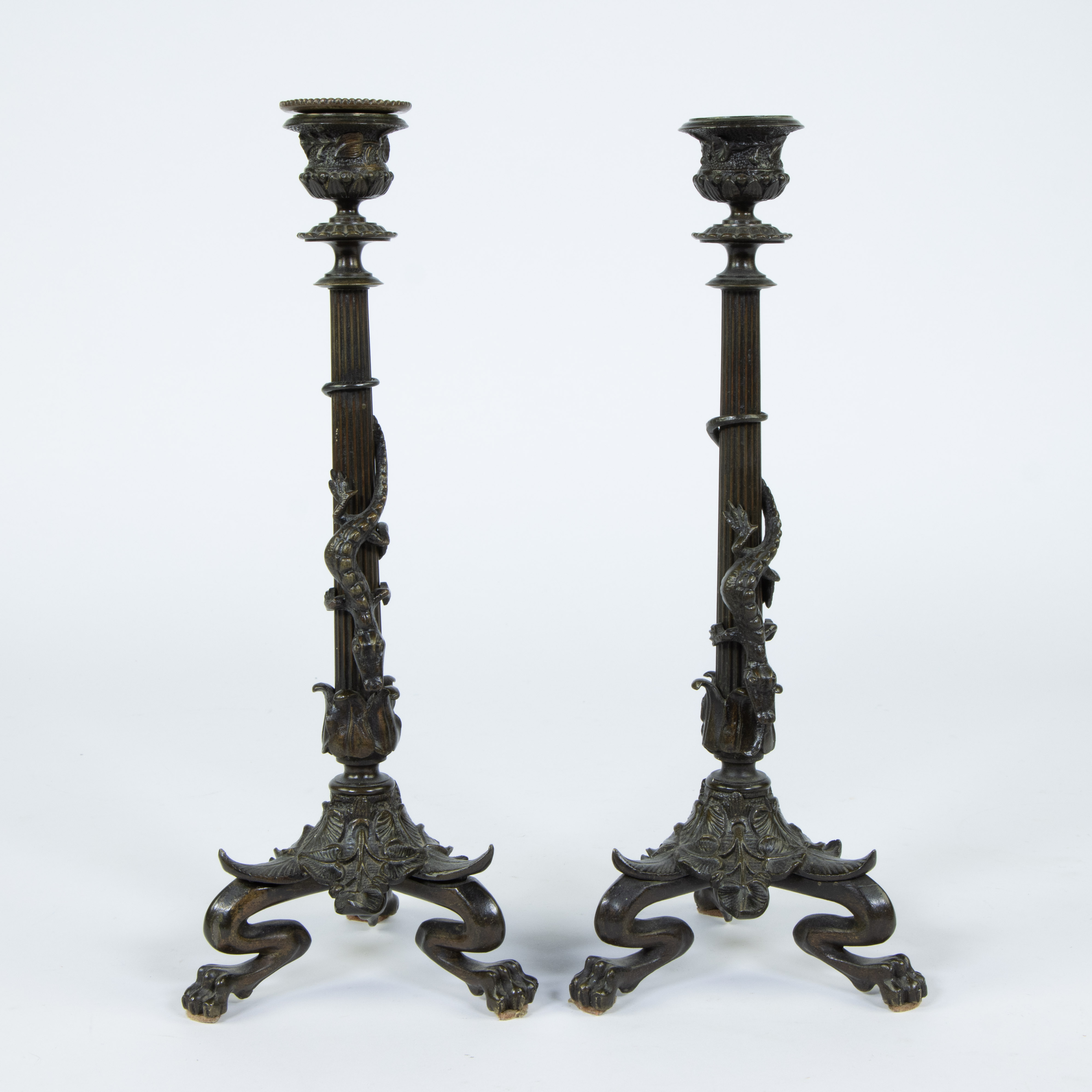 Pair of bronze candlesticks on lion feet decorated with a crocodile, Barbedienne, 19th century