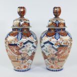 Pair of Japanese Imari lidded vases, 19th century