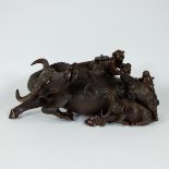 Chinese buffalo with 2 children in hardwood, 20th century