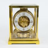 Jaeger-LeCoultre Atmos clock in gilt brass and original storage box, Swiss made. In working conditio