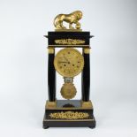 French Empire column clock with gilt bronze lion, circa 1830