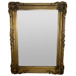 Exceptionally large gilded wooden mirror style Louis XV