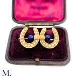 A Victorian Double Horseshoe Brooch