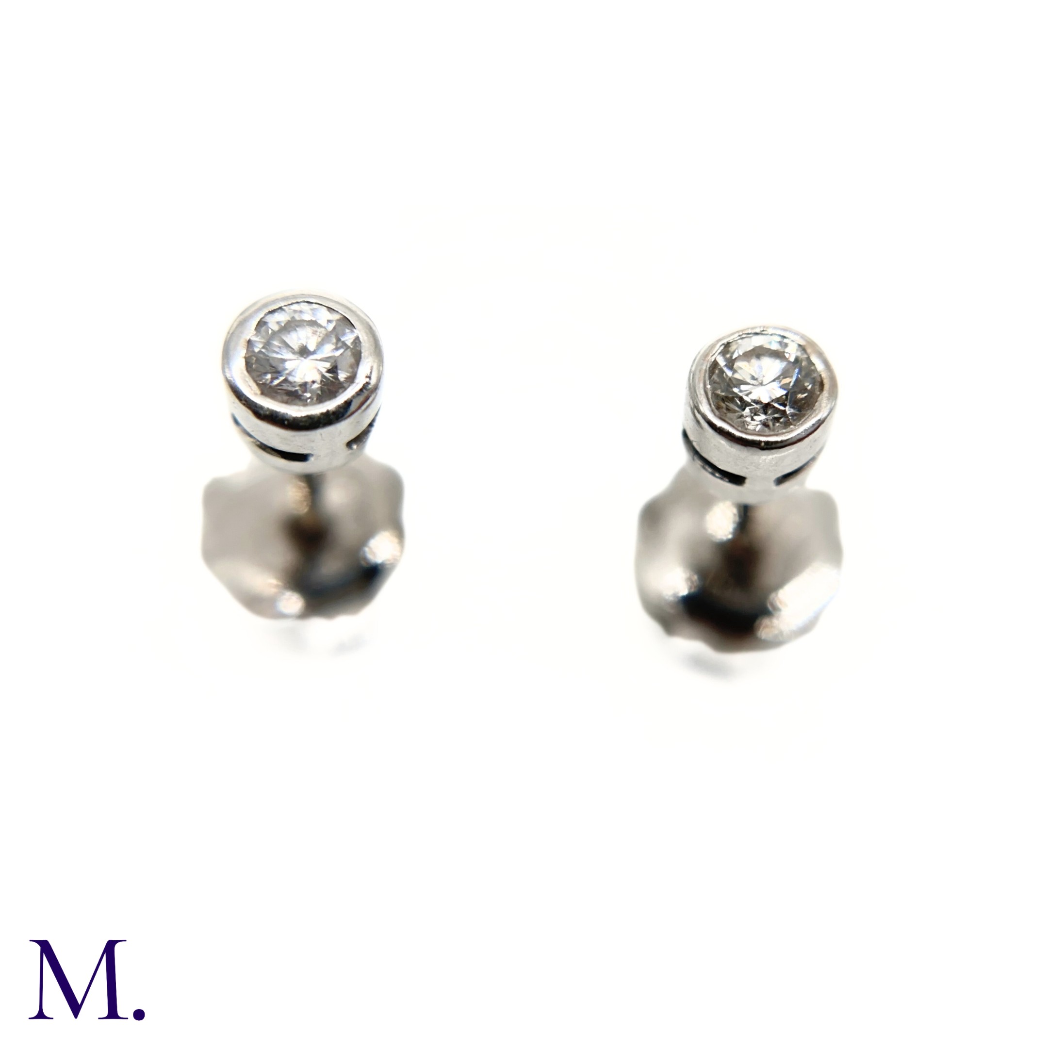 A Pair of Diamond Stud Earrings