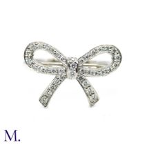 A Platinum and Diamond Bow Ring by Tiffany & Co.