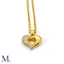 A Diamond Heart Pendant by Van Cleef & Arpels