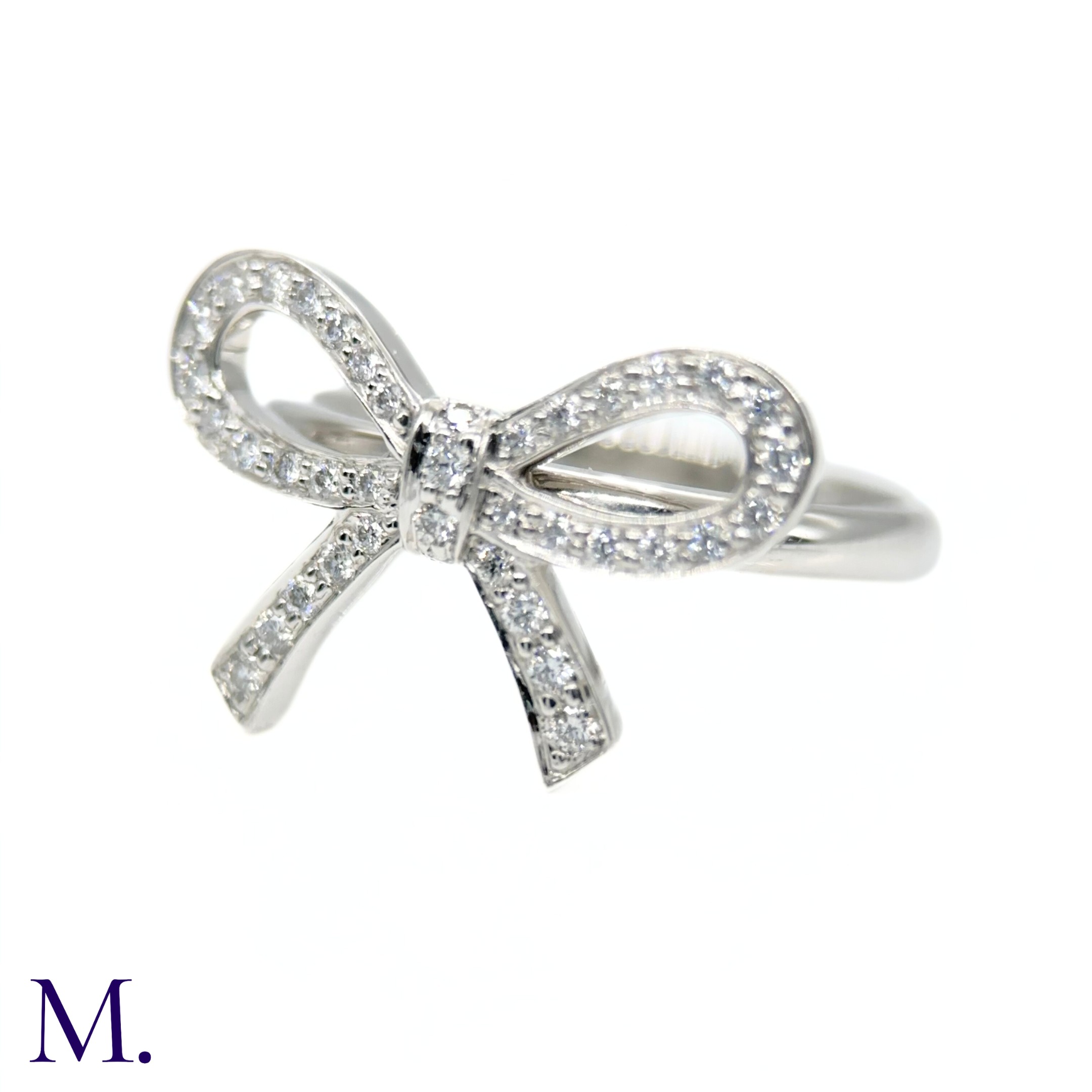 A Platinum and Diamond Bow Ring by Tiffany & Co. - Image 2 of 4