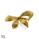 A Cartier 18ct Gold Bow Brooch