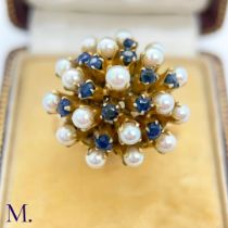 A Pearl and Sapphire Cluster Ring