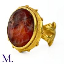 An Important Antique Carnelian Signet Ring The high carat signet ring is set with an oval-shaped