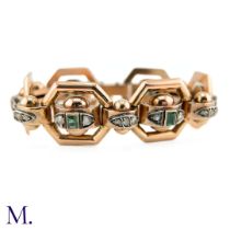 An Antique Emerald and Diamond Bracelet. The rose gold bracelet is set with six square/rectangular