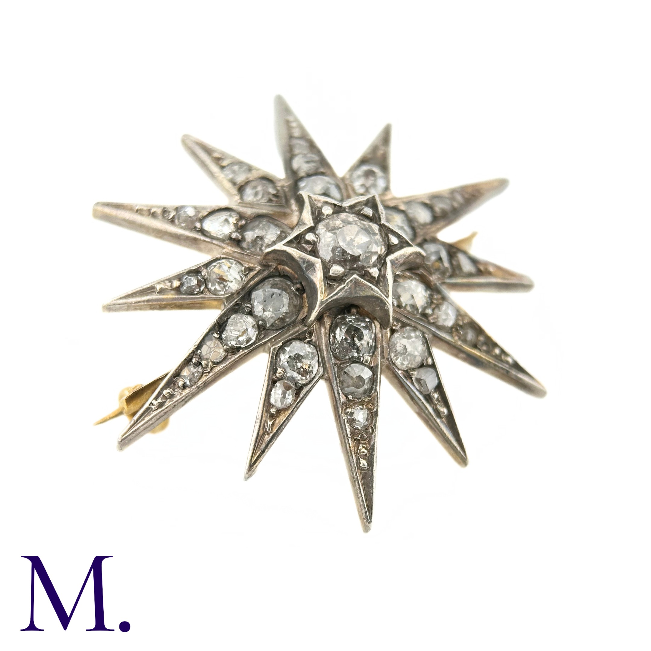 A Victorian Diamond Star Brooch The 19th Century star brooch is set with old cut diamonds, the - Image 2 of 6