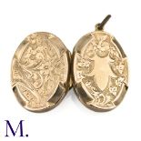 NO RESERVE - A 9ct Front and Back Locket The 9ct gold front and back are engraved. Inside are two