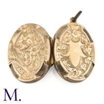 NO RESERVE - A 9ct Front and Back Locket The 9ct gold front and back are engraved. Inside are two