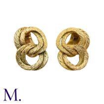A Pair of Gold Earclips by Georges Lenfant The 18ct yellow gold woven earclips are by French