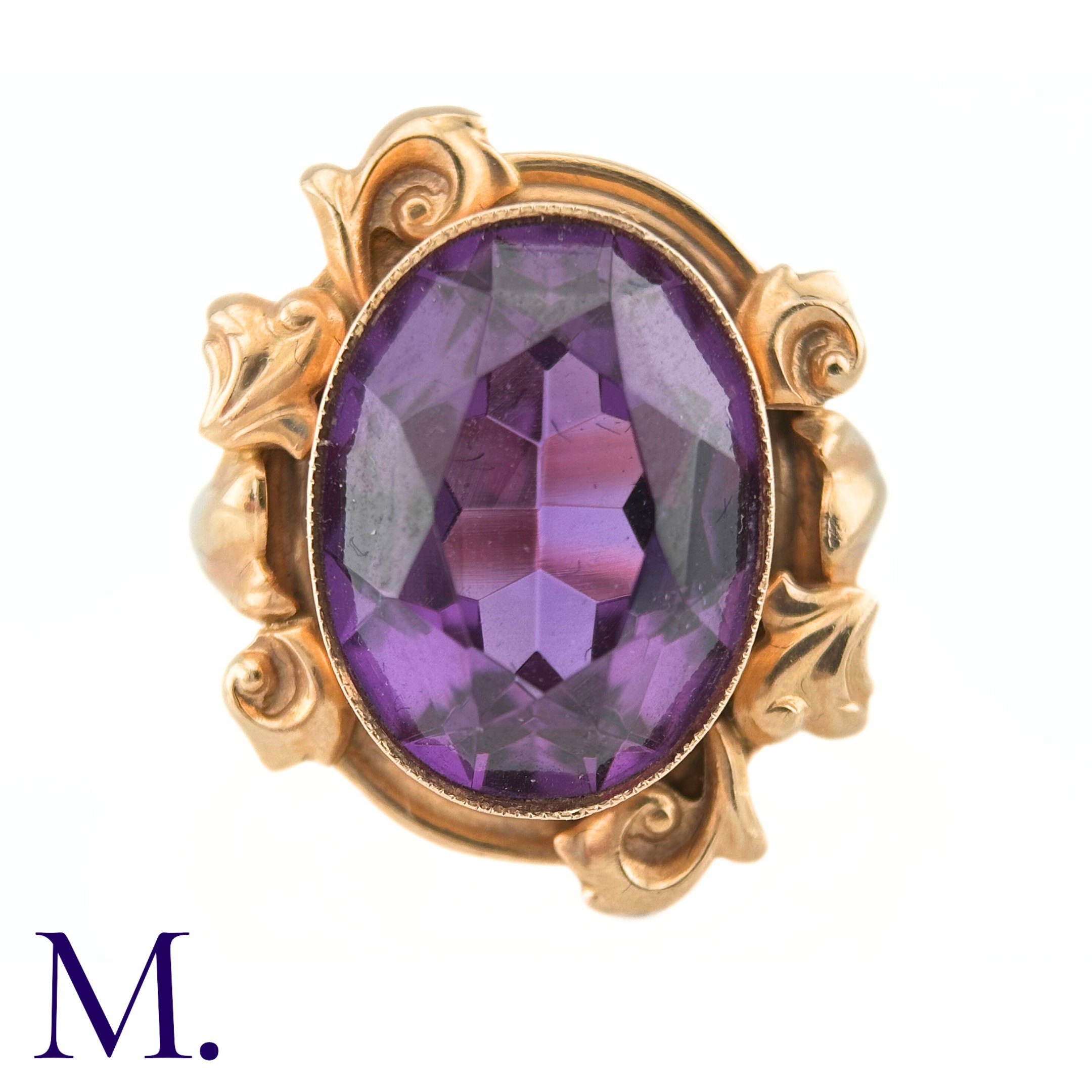 A Russian Purple Sapphire Ring The 14ct rose gold ring, with Russian hallmarks, is set with a