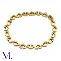 A Heart Bracelet by Cartier The 18ct yellow gold bracelet with alternating heart design is by