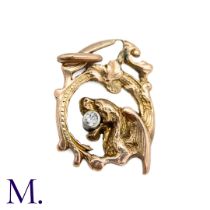 An Art Nouveau Chimera Pendant The antique gold chimera pendant is set with a small 5pt old cut