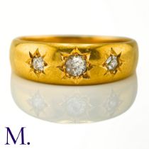 An Antique 3-Stone Diamond Gypsy Ring The 18ct yellow gold gypsy ring is set with three old cut