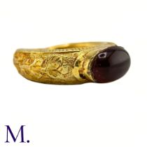 An Antique Garnet Signet Ring The exceptional ring is crafted from high carat gold with engravings