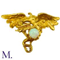 An Art Nouveau French Opal-Set Chimera Brooch The French 18ct yellow gold chimera brooch is set with