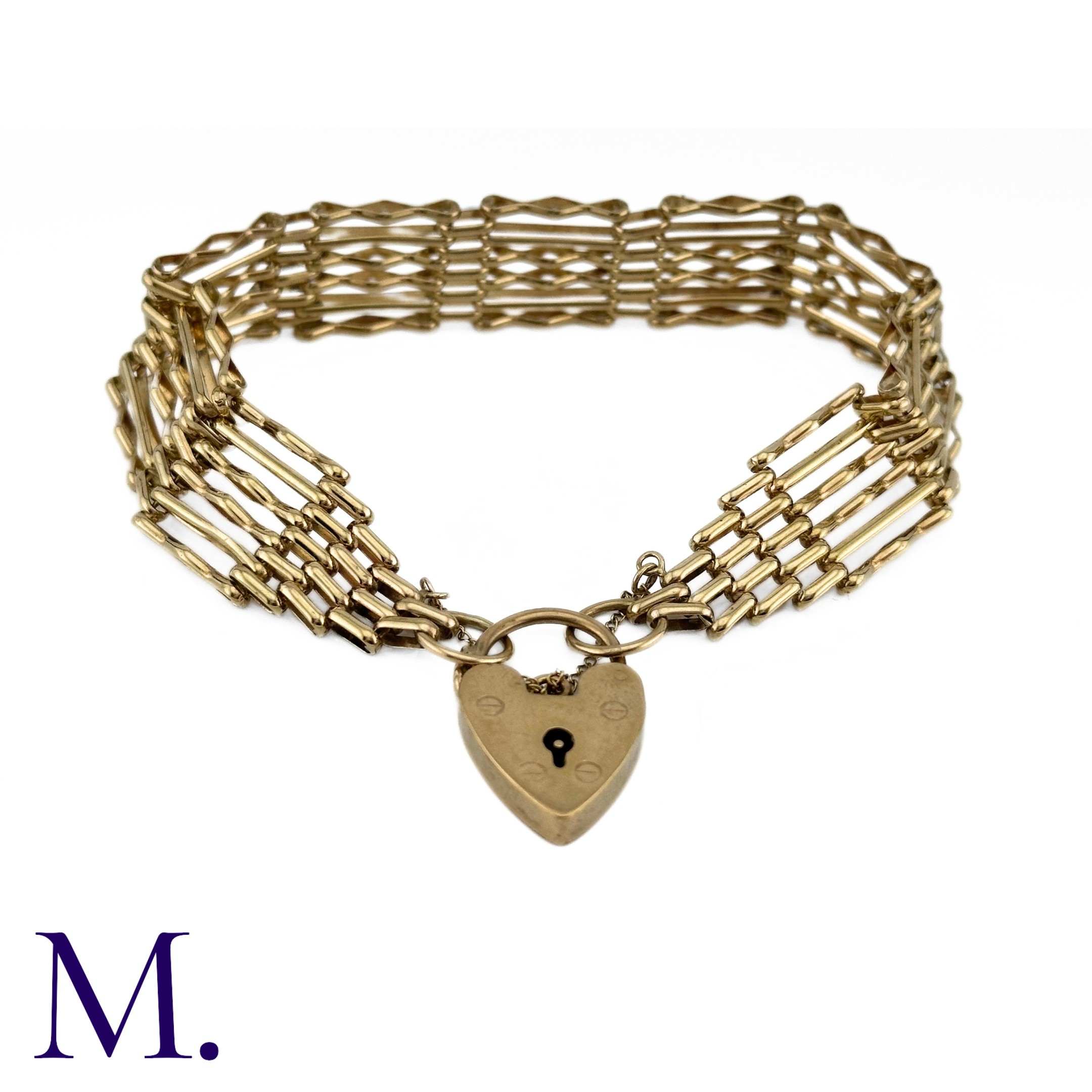 A Vintage Gold Gate Bracelet The 9ct yellow gold gate bracelet is secured with a heart-shaped - Image 2 of 3