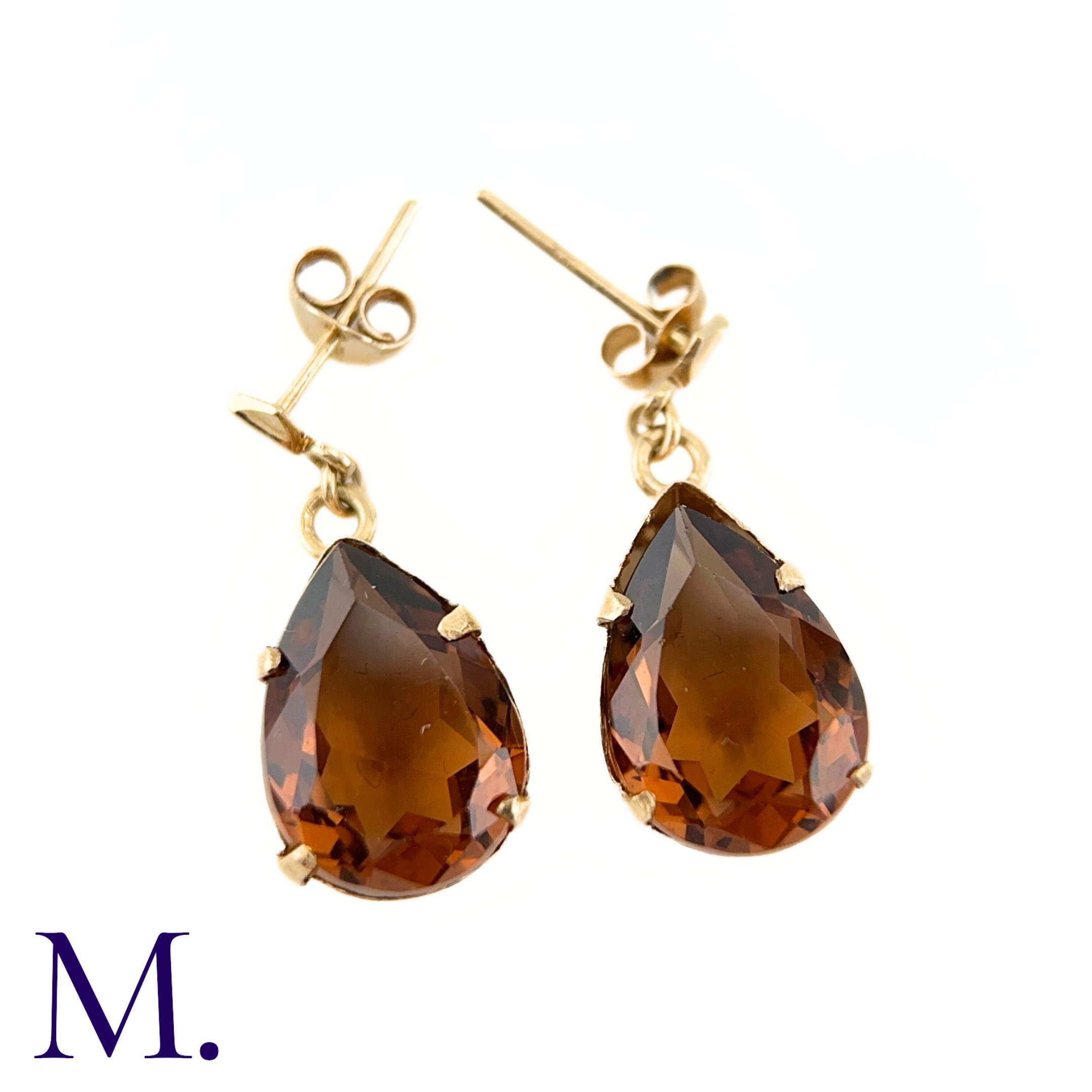 A Pair of Gemstone Earrings The 9ct yellow gold earrings are set with a burnt orange-brown pear- - Image 4 of 4