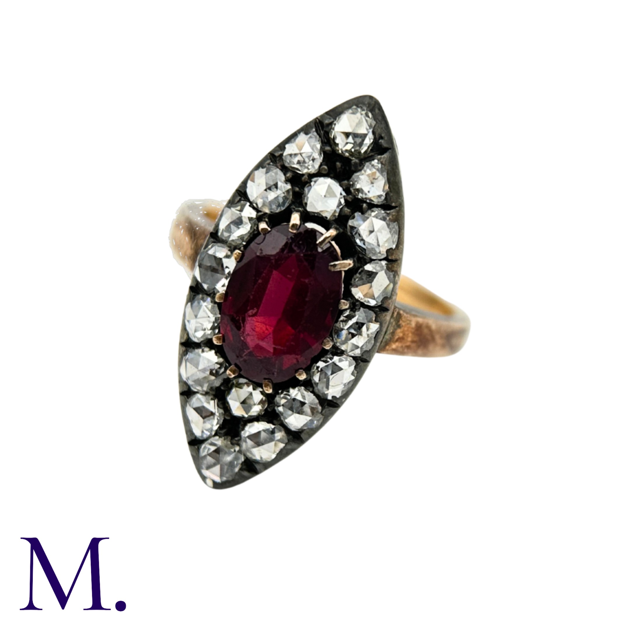An Antique Garnet and Rose Diamond Marquise Ring The marquise-shaped ring is set with a deep