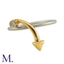 A Diamond Arrow Ring The platinum band is accented with an 18ct yellow gold arrow set with a small