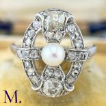 An Art Deco Pearl and Diamond Ring The 18ct white gold openwork ring is set with a pearl to the