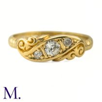An Antique Diamond Gypsy Ring The antique 18ct yellow gold carved ring is set with three old cut
