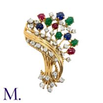 Retro Tutti Frutti Diamond and Gemstone Brooch This 1950s Tutti Frutti brooch is set with ruby,