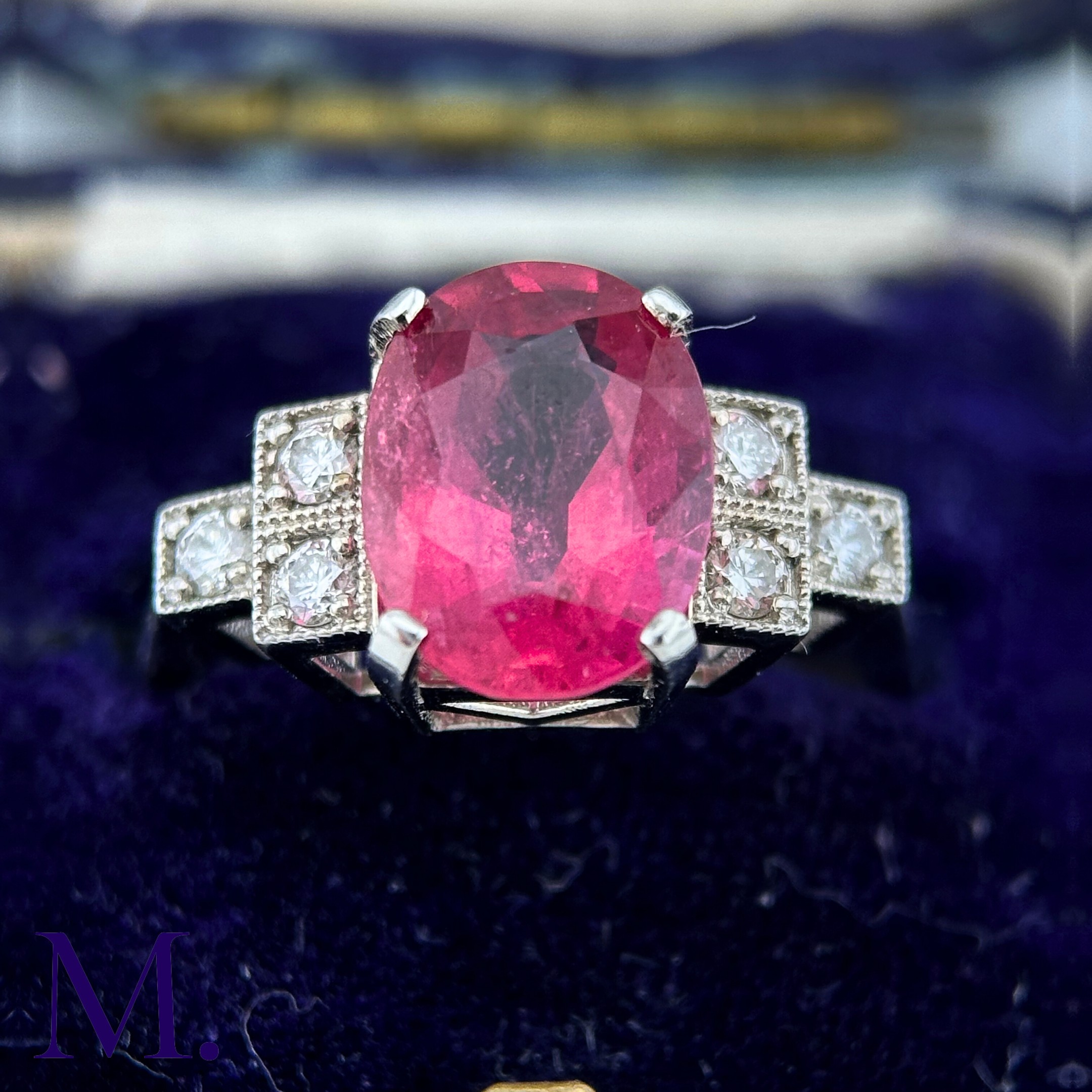 A Ruby and Diamond Ring The 18ct white gold ring is set with a bright pink ruby of approximately 3. - Image 8 of 8