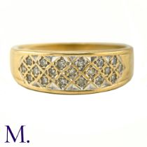 NO RESERVE - A Diamond-Set Wide Band The 9ct yellow gold band is set with nineteen small diamonds.
