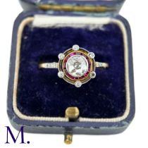 An Art Deco Ruby and Diamond Ring The Art Deco openwork ring is set with a diamond to the centre