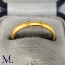 A 22ct Gold Band The band is hallmarked for 22ct gold and is dated 1933. Weight: 3.4g Date: M