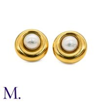 A Pair of Pearl Earclips by Chaumet The 18ct yellow gold earclips are by Chaumet Paris. Each is