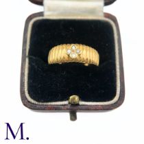 A French Diamond Fleurette Ring The 18ct yellow gold ring is set with four small round cut