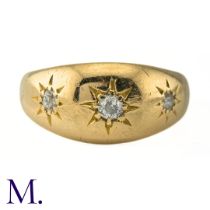 A 3-Stone Diamond Gypsy Ring The 18ct yellow gold band is set with three diamonds amounting to
