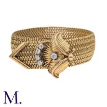 A French Gold and Diamond Buckle Bracelet The 18ct yellow gold woven bracelet terminates in a