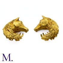 A Pair of Horse Earclips by Hermes The vintage 18ct yellow gold Horse earclips are by Hermes