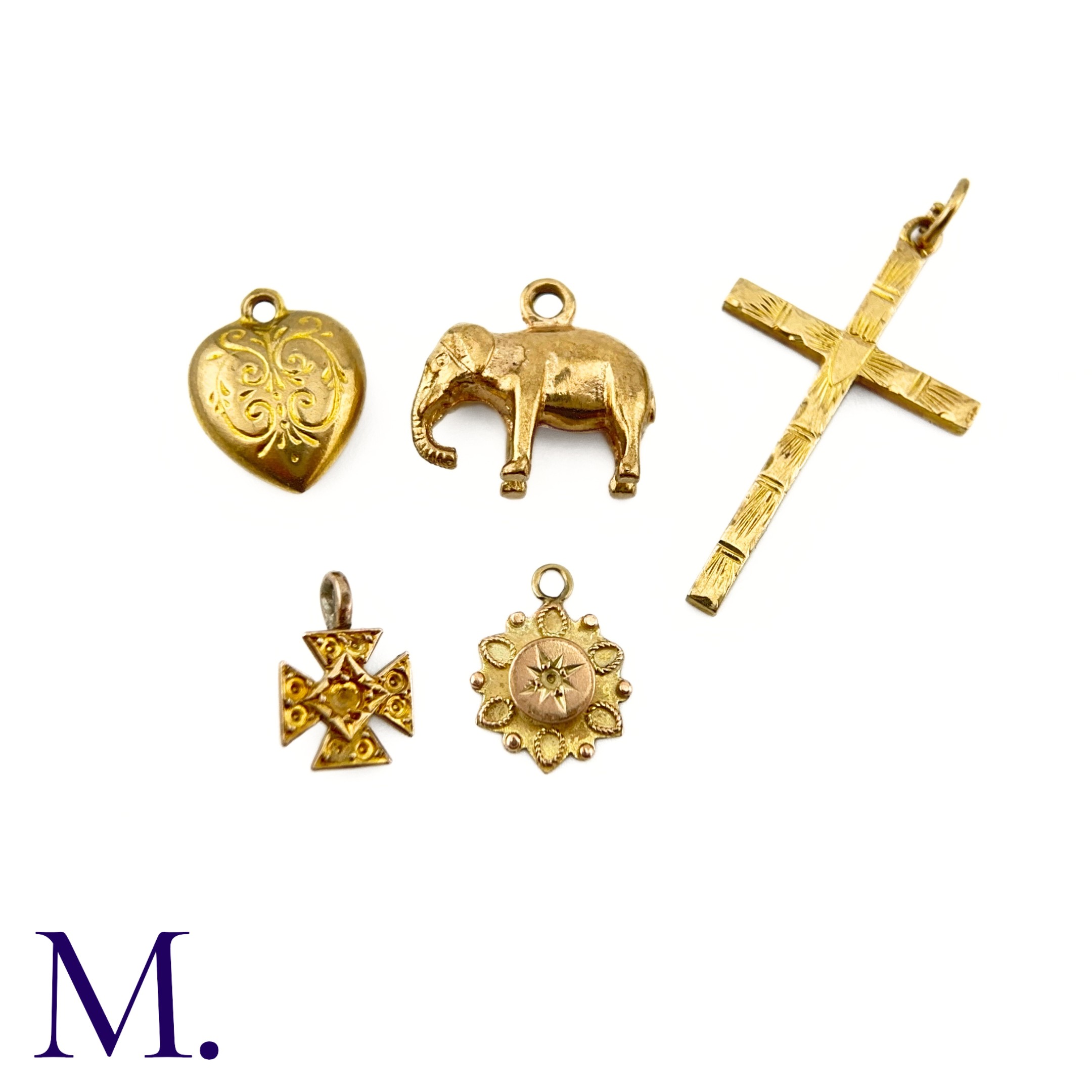 Five 9ct Gold Charms The lot includes various charms including a heart, a cross, an elephant and two