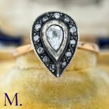 An Antique Rose Diamond Ring The rose gold band tapers into a pear-shaped setting in silver which is