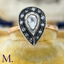 An Antique Rose Diamond Ring The rose gold band tapers into a pear-shaped setting in silver which is