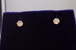 PAIR OF DIAMOND STUD EARRINGS