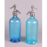 A lot of two blue glass spray bottles. France, 1st half 20th century.